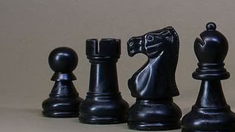 Observe the sleek lines of the silhouettes shown here. Which iconic game claims these pieces as its own?