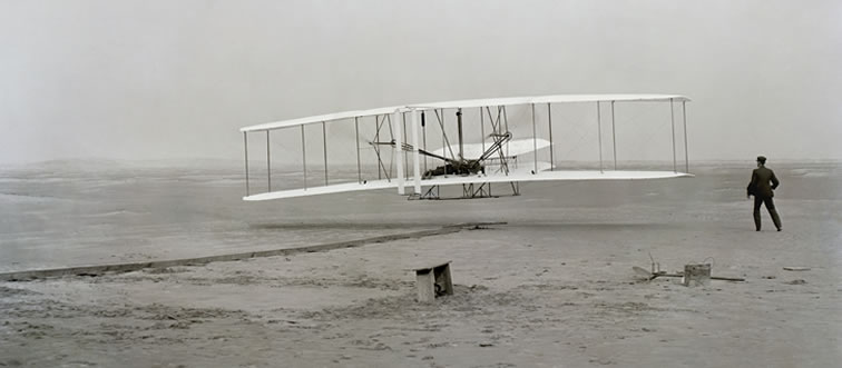 In 1903, two visionary brothers forever changed how we travel by designing the first successful airplane. Which family signature is on this aviation milestone?