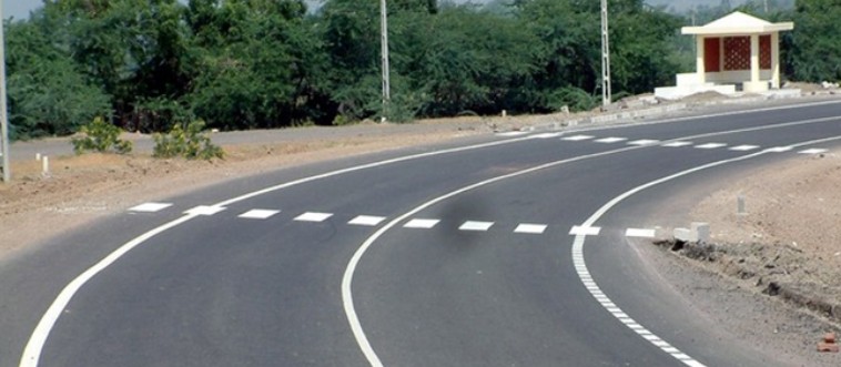 Consider the visual grammar of the road: what is a solid white line between lanes telling you to do?