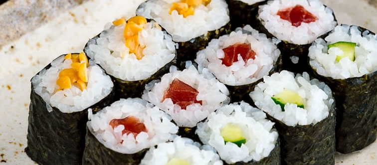 Spot the signature preparation that elevates seasoned rice and fresh seafood...